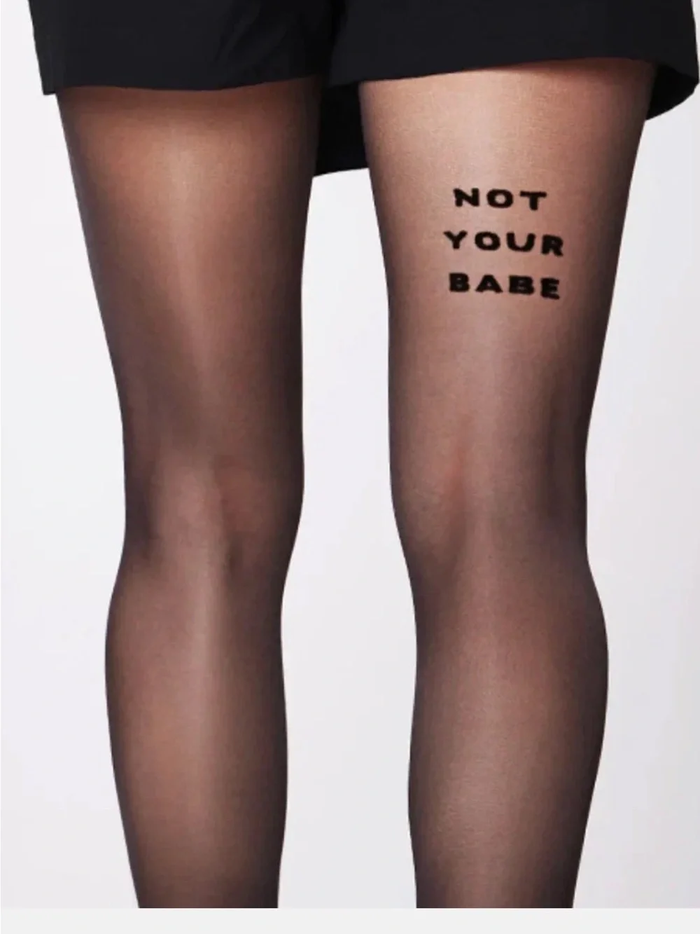 Sheer Black Statement Tattoo Tights with 'NOT YOUR BABE' Text